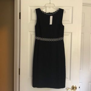 Black sleeveless sheath dress